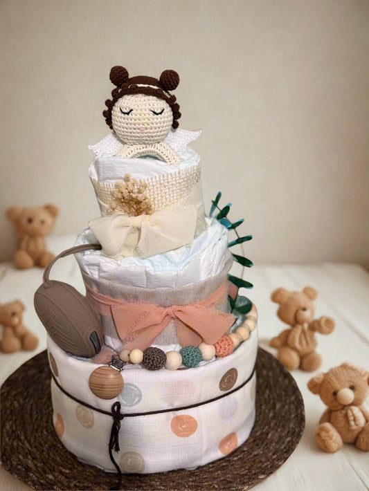Safari giraffe diaper cake baby shower centerpiece designed in soft yellow, cream, and natural burlap tones. This three-tier arrangement features rolled white diapers wrapped in warm pastel yellow fabric at the base and finished with a delicate gray twine bow for a charming rustic touch.

The middle tier is wrapped in natural burlap ribbon and tied with an elegant ivory satin bow, complemented by a coordinating silicone and crochet beaded pacifier clip in mustard, cream, and soft gray hues. A matching neutr